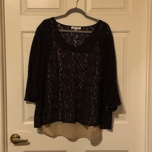Navy & beige lace blouse with ruffle sleeves.